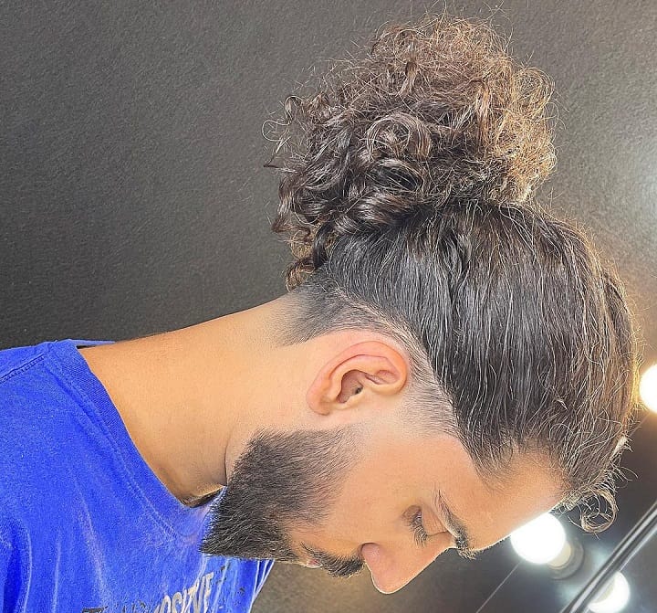 Curly Hair Messy Ponytail low fade ponytail
low man ponytail
low ponytail male
