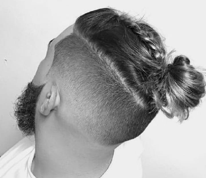 Undercut Bun With Braidponytail hairstyle men
man ponytail
ponytail man
