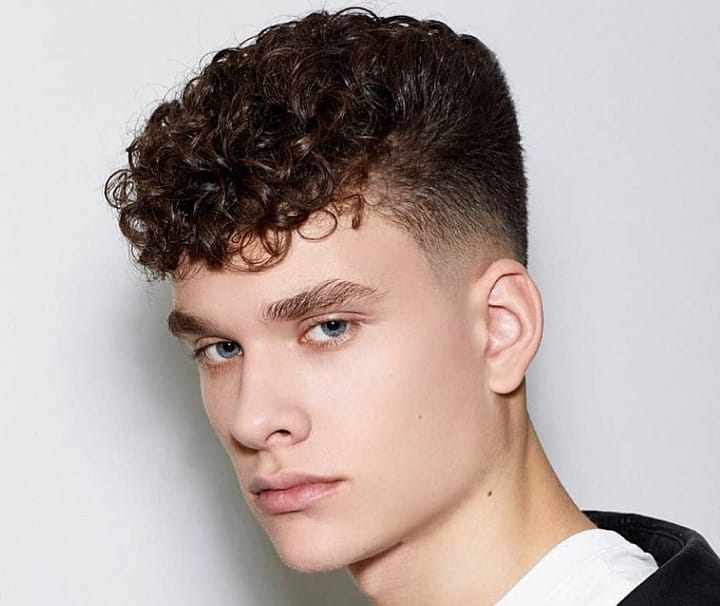 Mid Fade Men’s Permed Hairstyle 