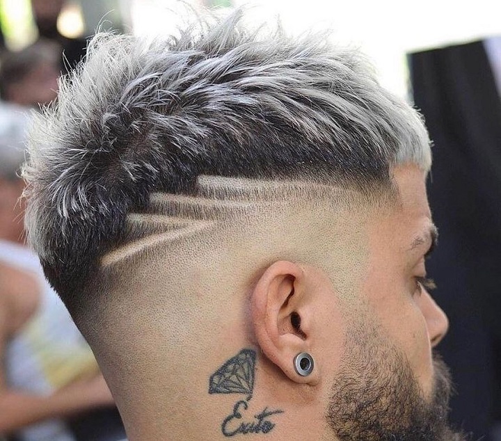 Bleached Spiky Haircut With Design Lines