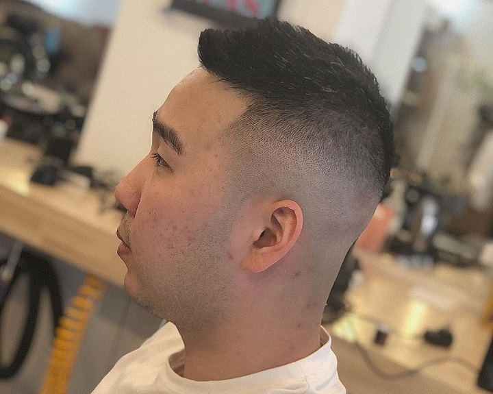 Crew Cut With a Hard Partlow fade haircut asian
low taper asian
mid length asian haircuts male
