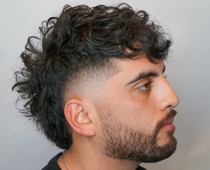 Curly Mohawk men's hairstylelayered haircut for men layer hair cut men mens layered haircuts 