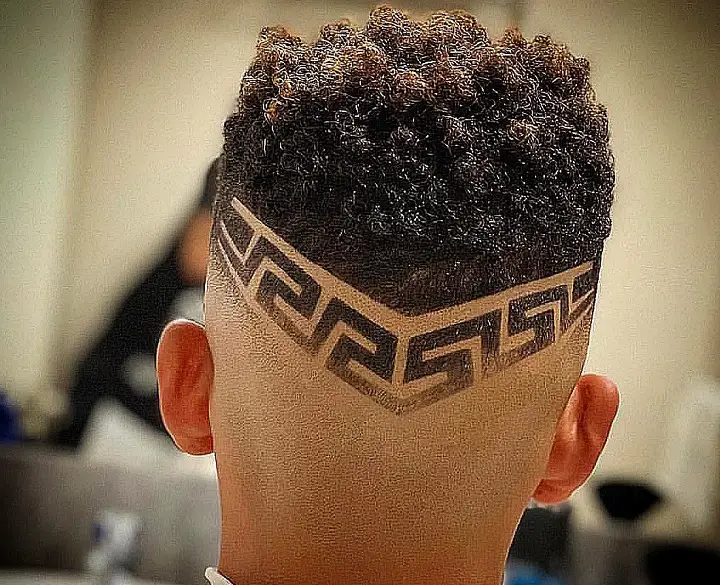 Shaved Sides Haircut For Men Curly Top And Lace Design