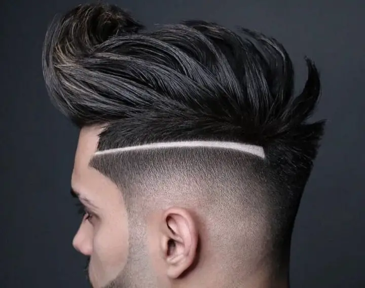 Long Hipster Faux Hawk and Razor Fade and Part haircut shaved sides