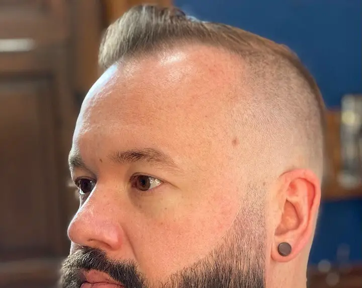 Skin Fade And Slick Bangs