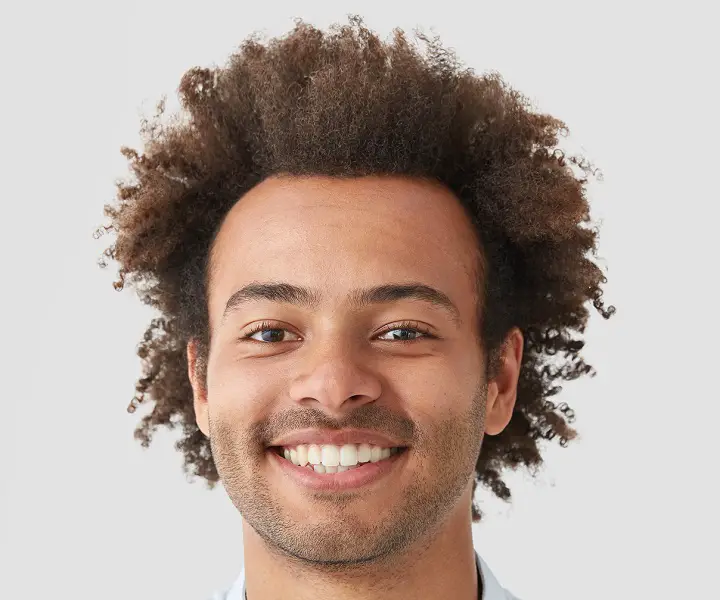 Brushed Curly Hairstyle for Black Men