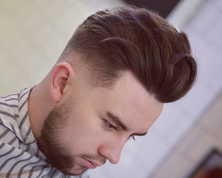 Guys mid fade classic Pompadourmid fade style
mid fade trim on top
mid fade with pompadour
