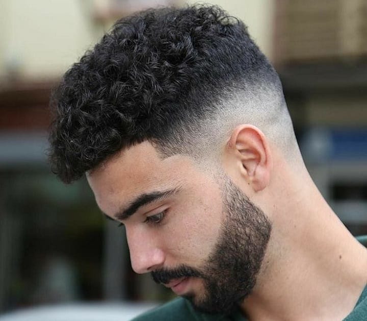 Classic Short Curly Haircuthow to get a curly undercut
long curly undercut men
low undercut curly hair
