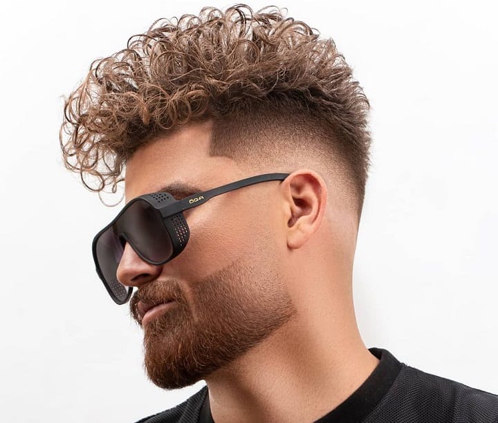 Fauxhawk modern curly hair with tapered undercut.
short curly hair undercut male
short curly hairstyles with undercut
