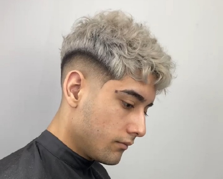 Hard Fade Mohawkfade haircut with medium top
fade with medium top
faded medium hair
