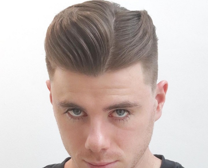Mid Taper Fade With Hard Part Comb Over