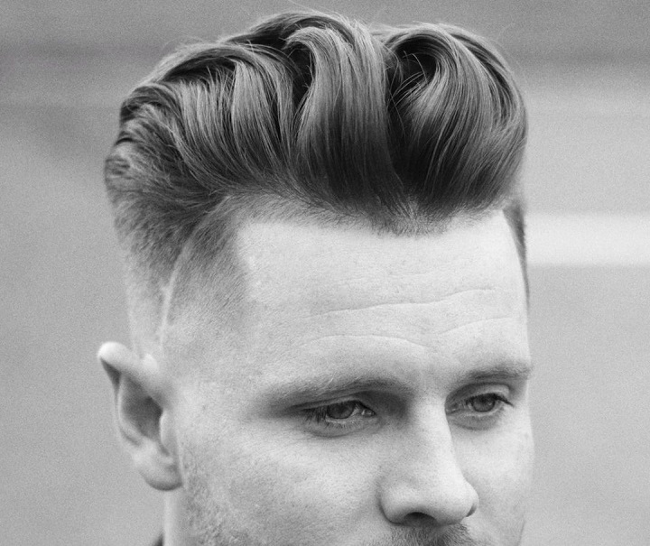 Mid-Fade Pompadourmid fade vs low fade
mid fade with a side quiff
mid fade with curls
