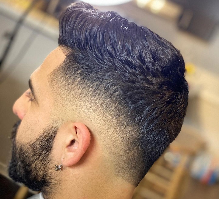 Short Pompadour With Beard And Moustachemedium fade haircut back
medium fade long on top
medium fade side part
