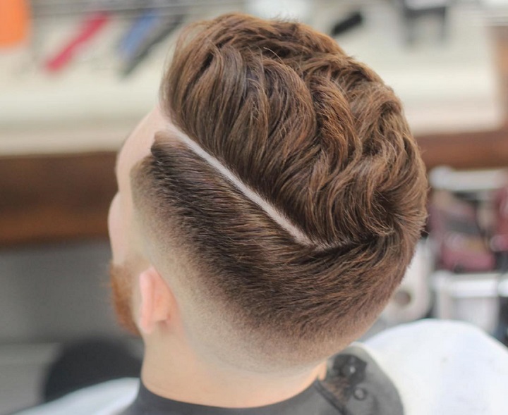 Textured Top And Sidelinelaw taper fade
long curly hair taper fade
long hair mid fade haircut
