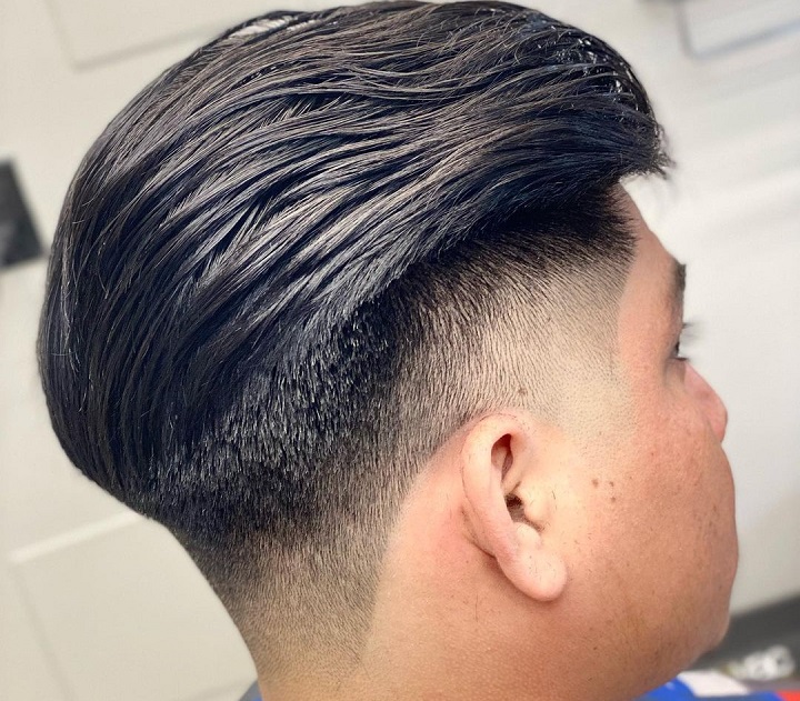 Volumed Slick Back Without Goateemedium skin fade haircut
medium top fade haircut
men's haircut mid fade long top
