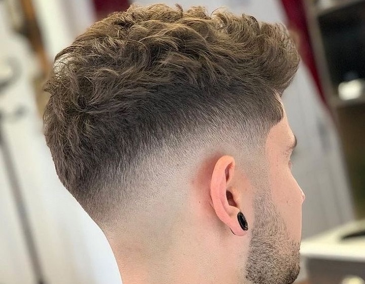 Wavy Topmen haircut medium fade
men haircut mid fade
men mid fade hairstyle
