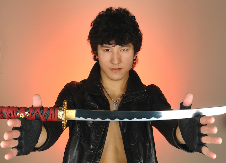 Young Samurai Man Holding Catana Sword