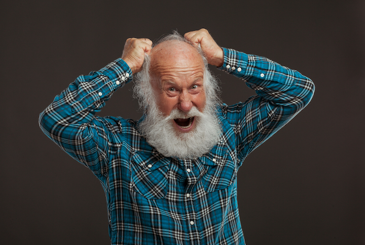 Angry Bearded Old Man Pulling His Hair