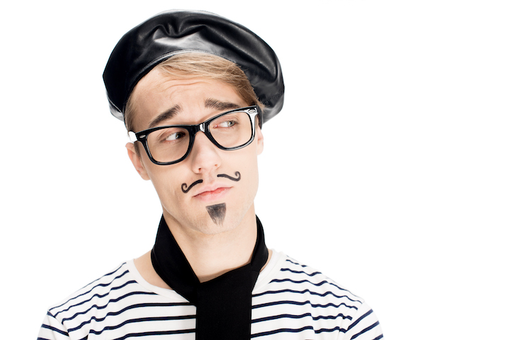 French Man With Glasses and Drawn Mustache