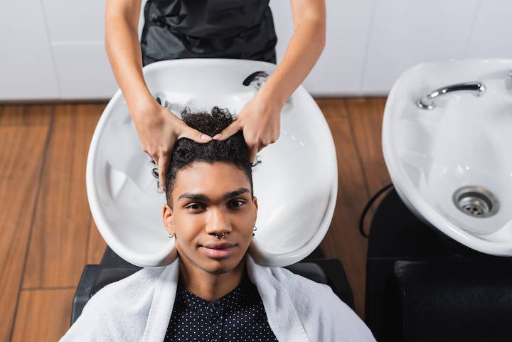 Barber Washing Black Men's Hair