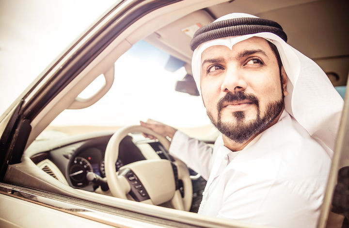 Bearded Arab Man Driving a Car