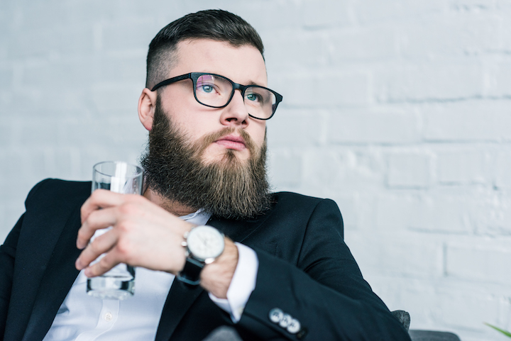 Bearded Man With Glasses in a Suit