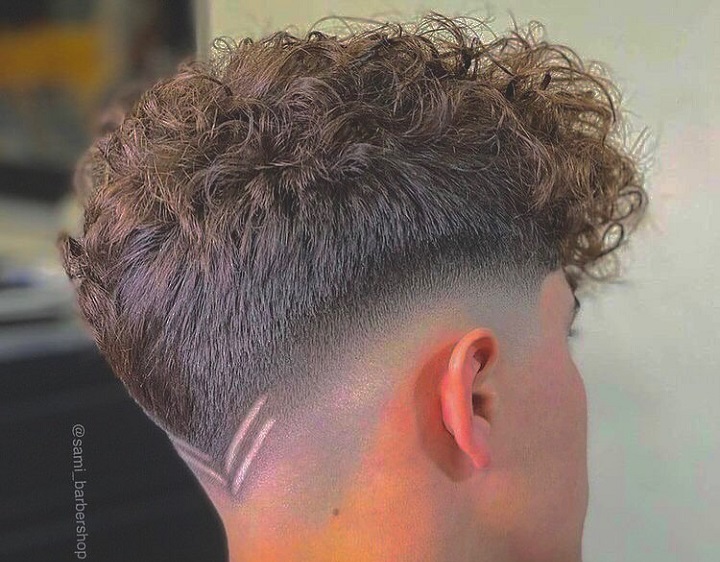 Double V Lineslines on hairstyle
lining design haircut
lining haircut back
