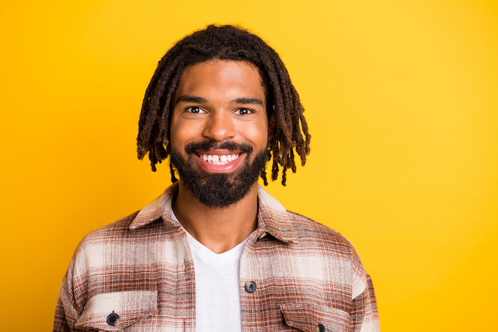 Enthusiastic Black Guy With Beard and Long Twists