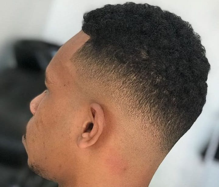 Fade And Short Topafro men hairstyles
afro haircuts for guys
afro men
