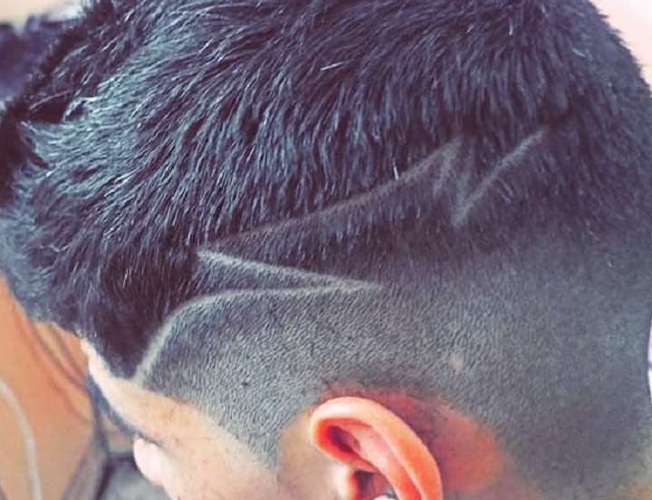 Fade Line Zig Zaghair cut style with line
hair cut with 2 lines
hair cut with a line on the side
