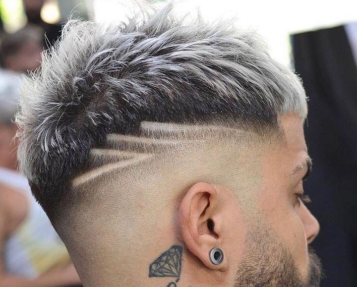 Fade With Notchesdesigns on side of head for guys
double line fade
double line hair cut
