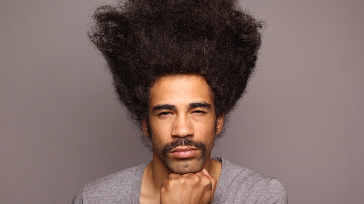Guy With Horseshoe Mustache and Huge Hair