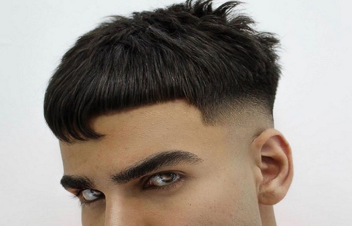 Man With Asymmetrical Ceaser Hairstyle