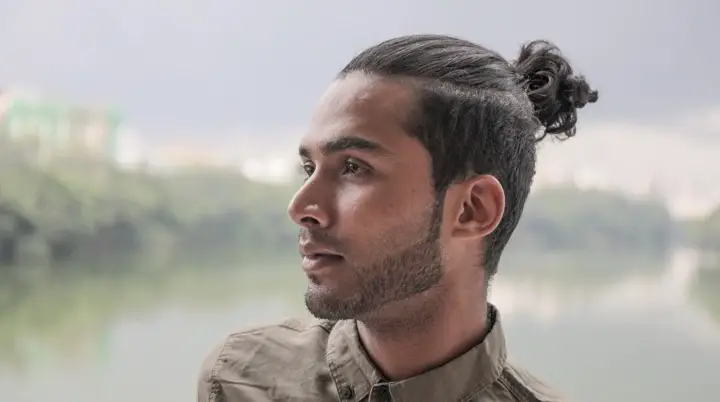 Men With Long Man Bun and Undercut men's hair undercut long men's haircuts 2023 men's long hair undercut styles 