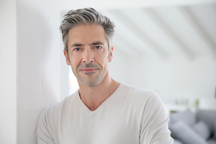 Middle Aged Man With Greying Hair and Modern Hairstyle