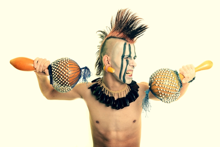 Native American Guy With Mohawk and Traditional Instruments