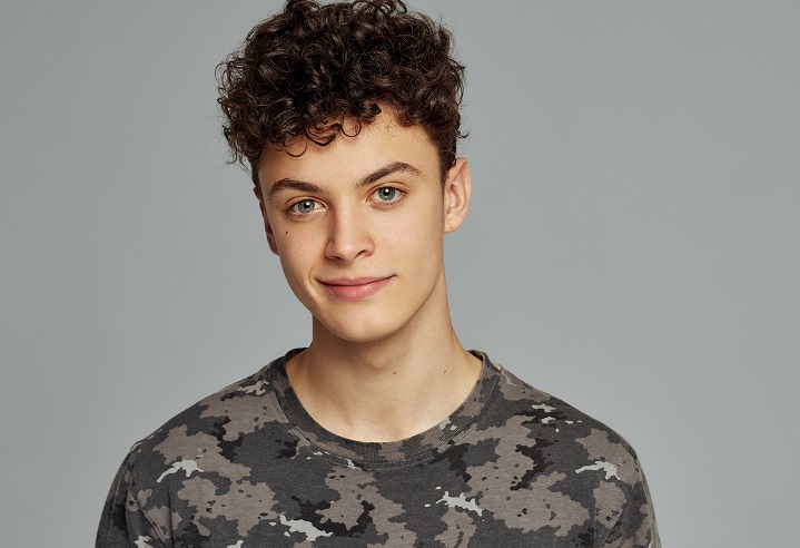 Portrait of Smiling Man With Tight Perm