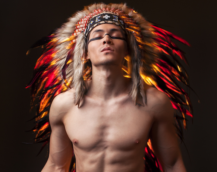 Young Native American Wearing Traditional Headdress