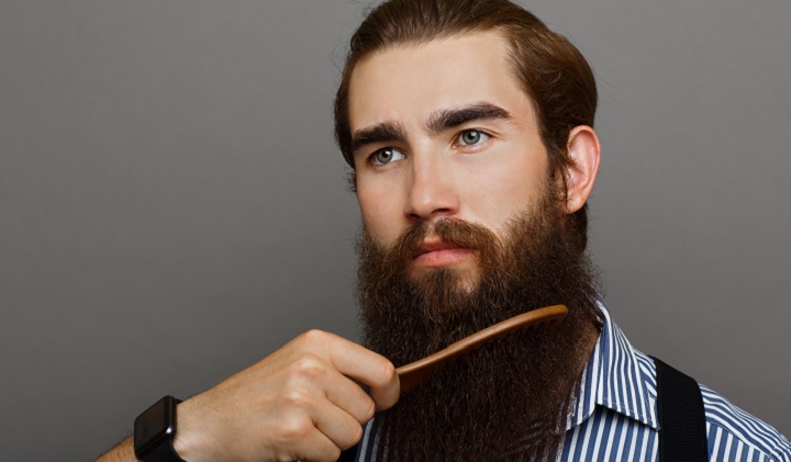 Man Combing His Long Beard