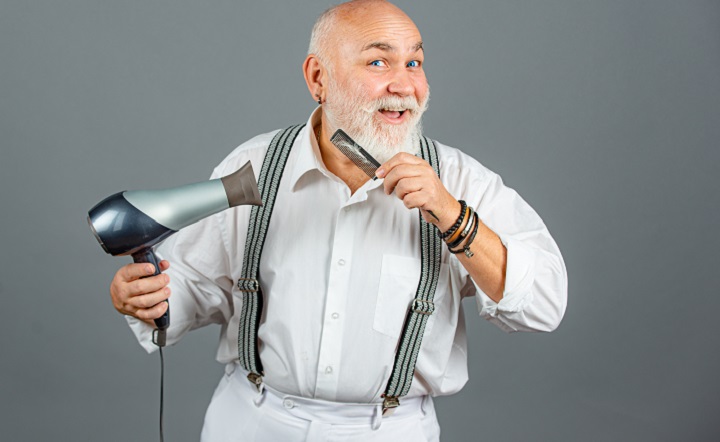 Older Man Combing and Drying His Beard