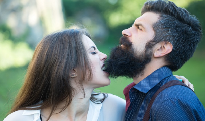 Woman Biting Man's Beard