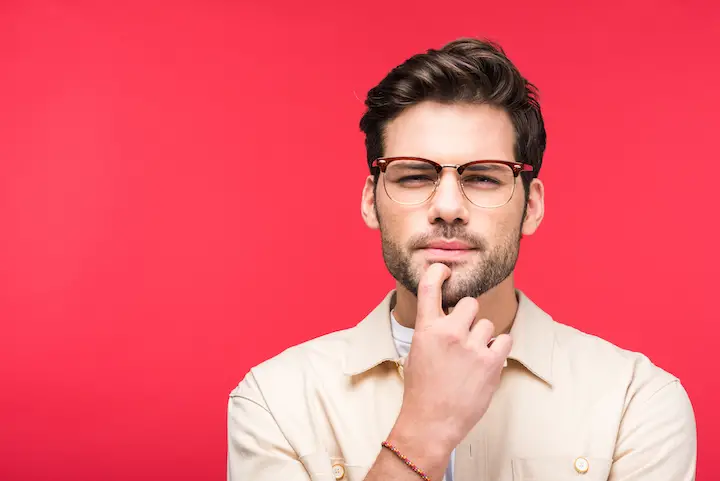 Guy With Glasses and Short Beard Thinking