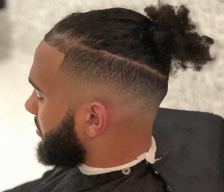 Bald Fade With Ponytail and Long Beard 