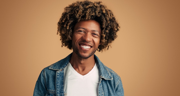 Smiling Black Man With 3C Curly Hair