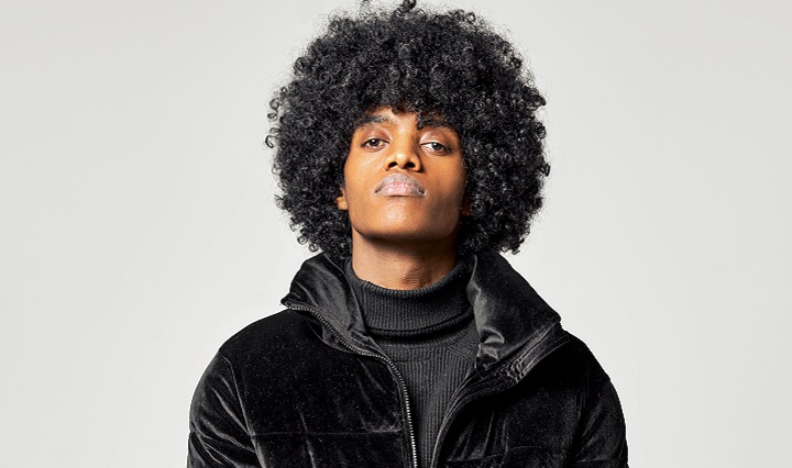 Black Man in Black Jacket With Frizzy Afro Hairstyle