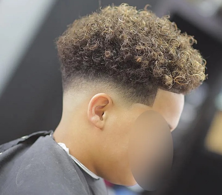 Curly Boy's Top And Fade
