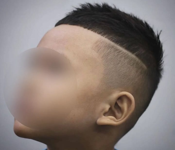 Boys High Fade Featuring Styled-Up Bangs 