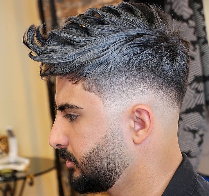 Long Strands With Bald and Heavy Stubble Fade 