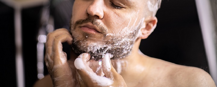 Man Shampooing and Washing His Beard
