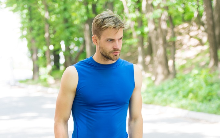 Blonde Man With Athletic Haircut in a Blue T-Shirt